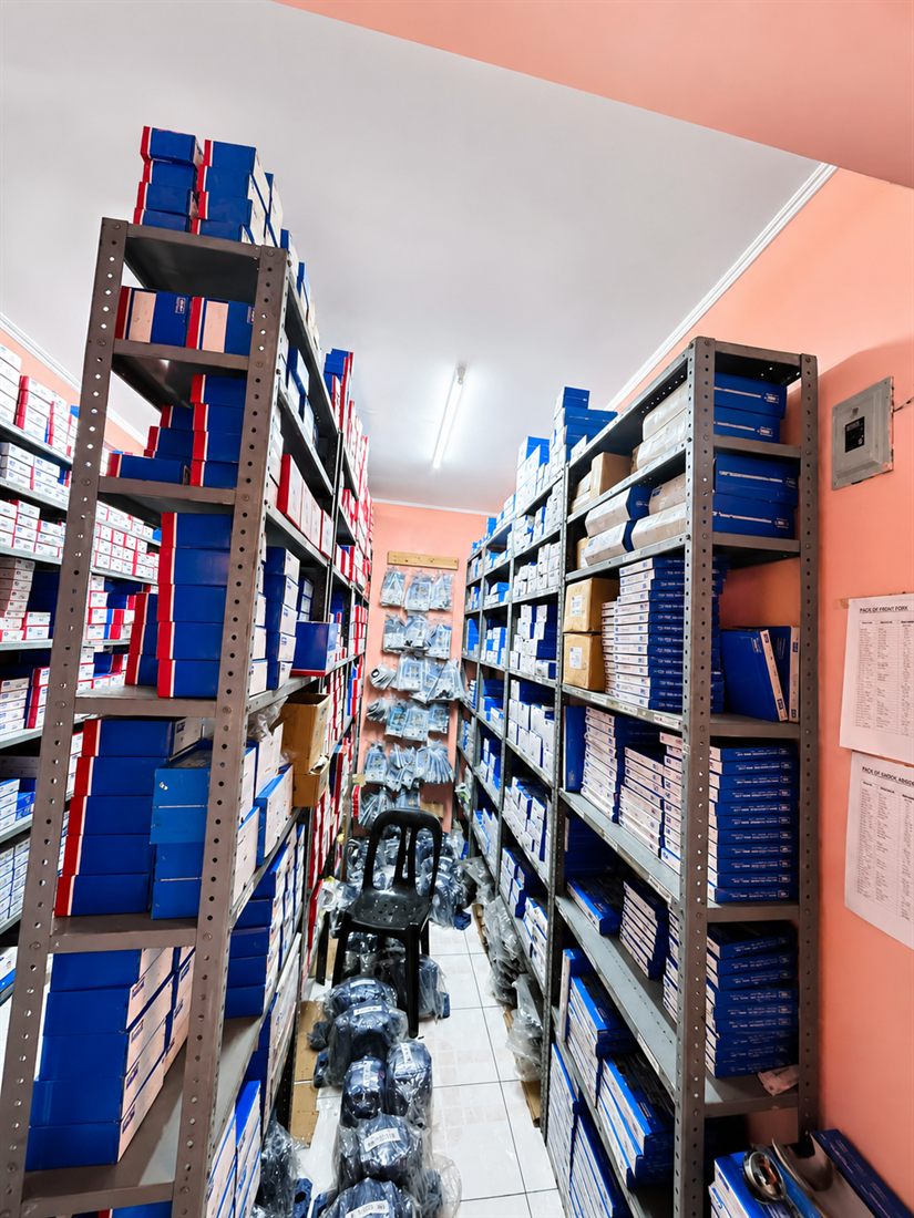 Aisle of shelves stocked with genuine SKF bearing boxes in RLR's Lipa City warehouse